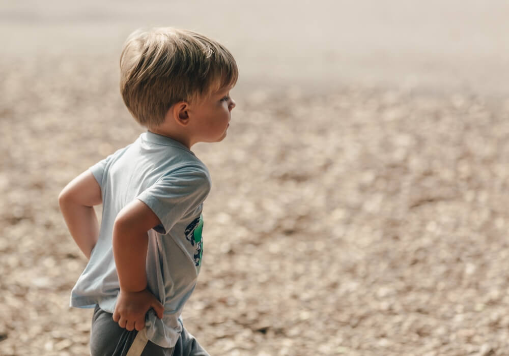 little-blond-boy-running-holding-his-pants-up (1)
